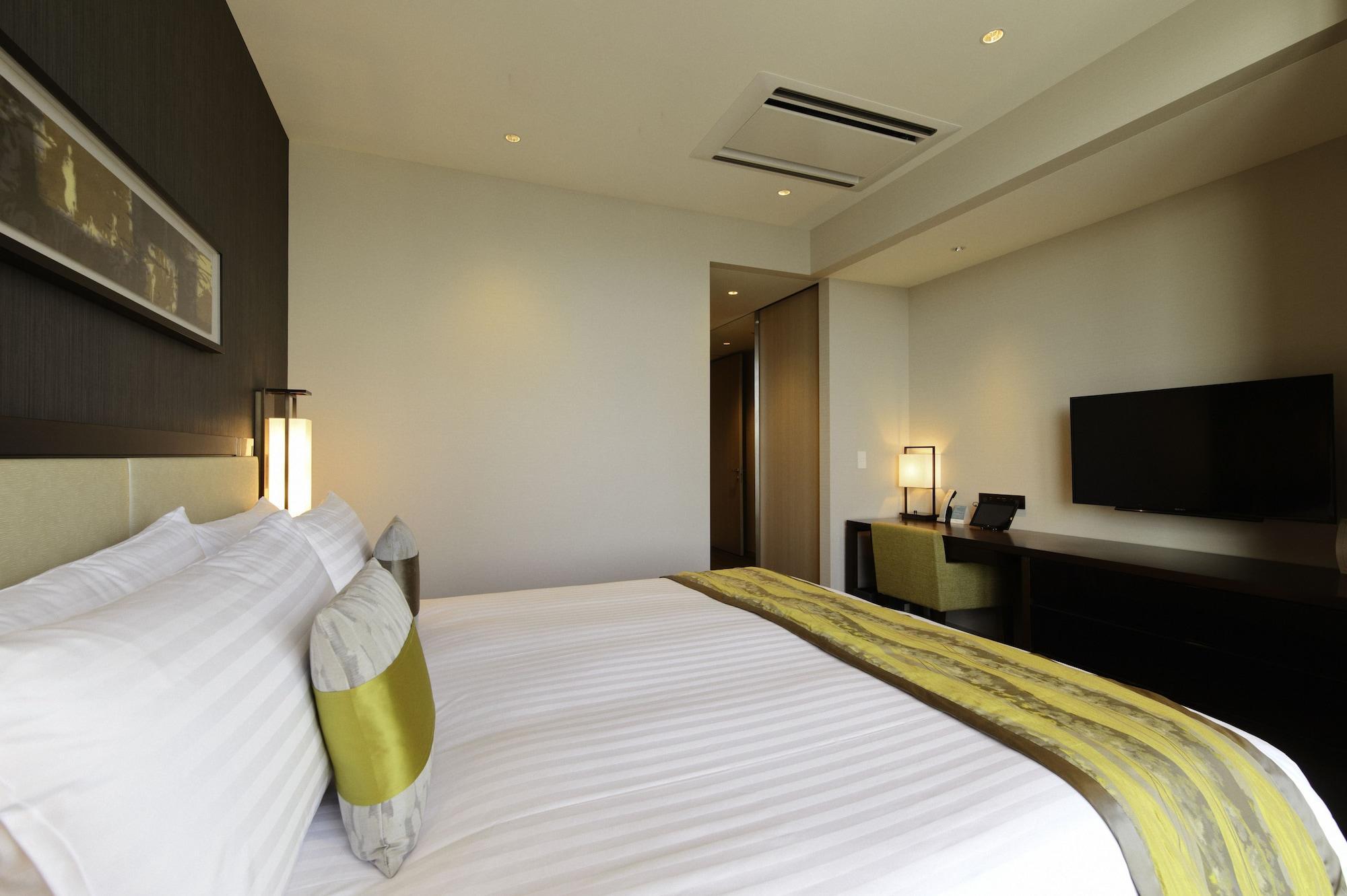 Oakwood Premier Tokyo Hotel Exterior foto A room at the hotel