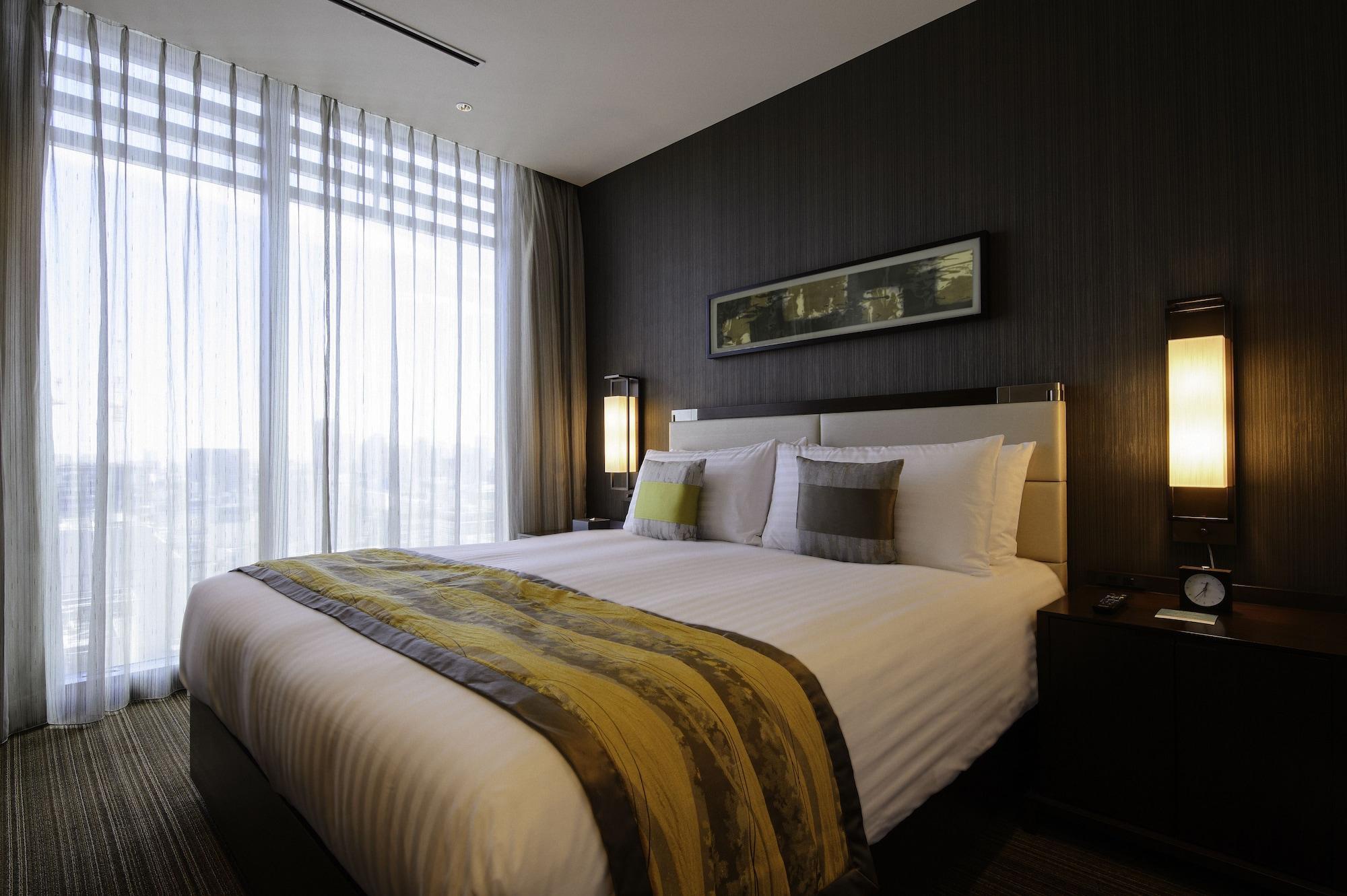 Oakwood Premier Tokyo Hotel Exterior foto A bedroom at the hotel