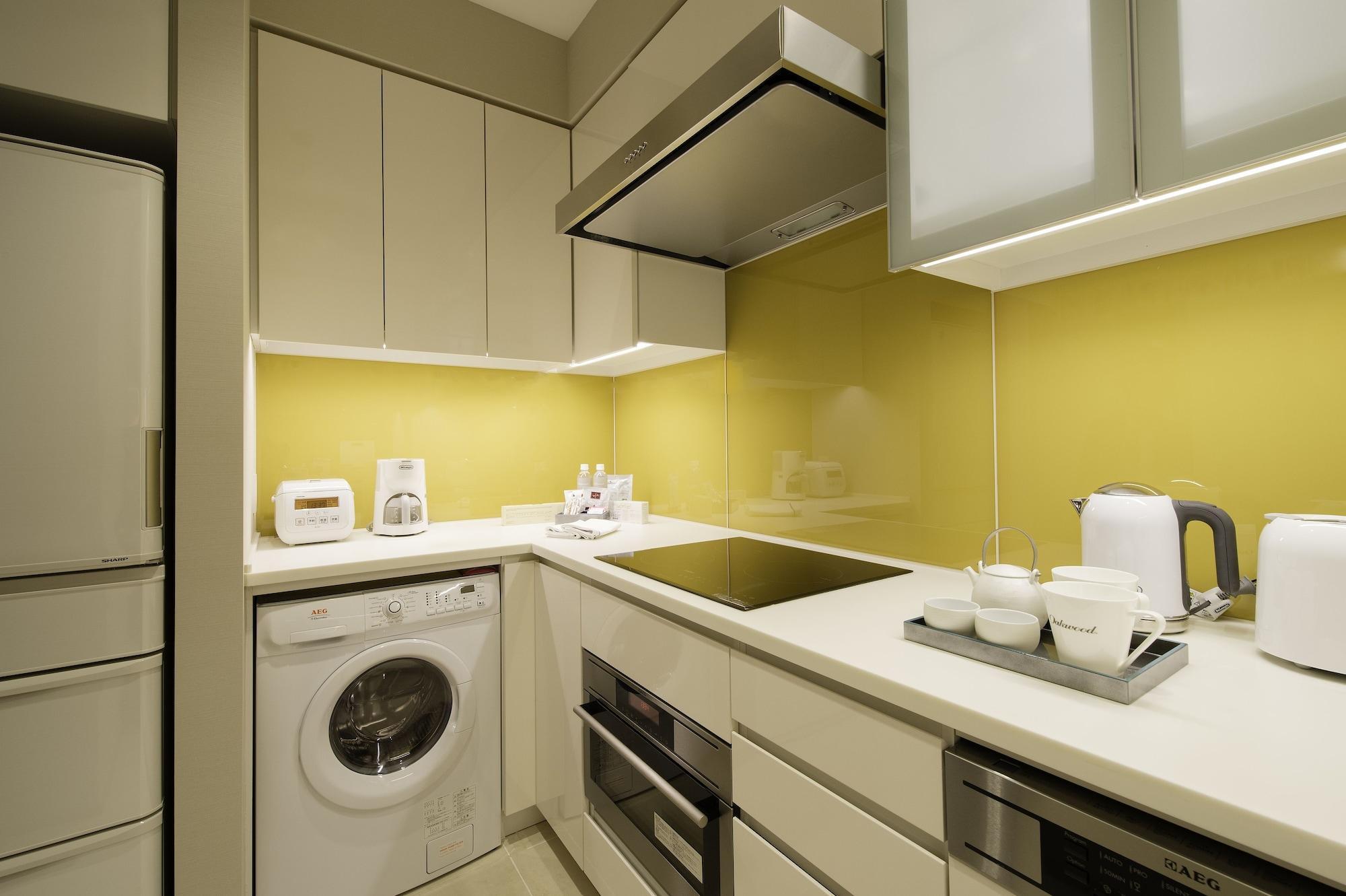 Oakwood Premier Tokyo Hotel Exterior foto A typical kitchen in a serviced apartment
