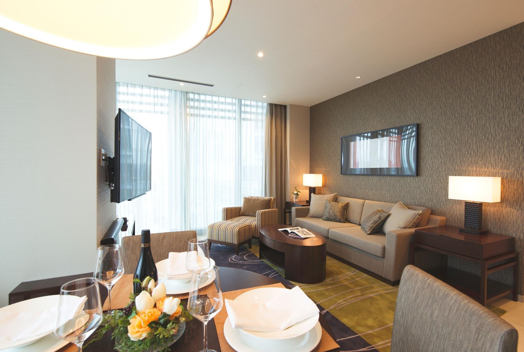 Oakwood Premier Tokyo Hotel Exterior foto A living room at the hotel