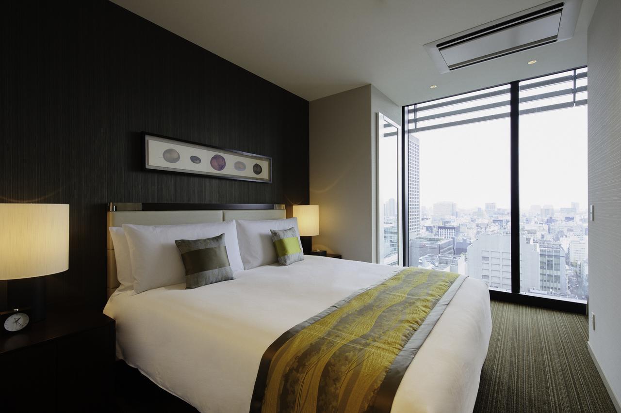 Oakwood Premier Tokyo Hotel Exterior foto A bedroom at the hotel