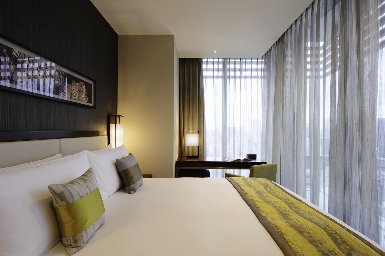 Oakwood Premier Tokyo Hotel Exterior foto A bedroom at the hotel