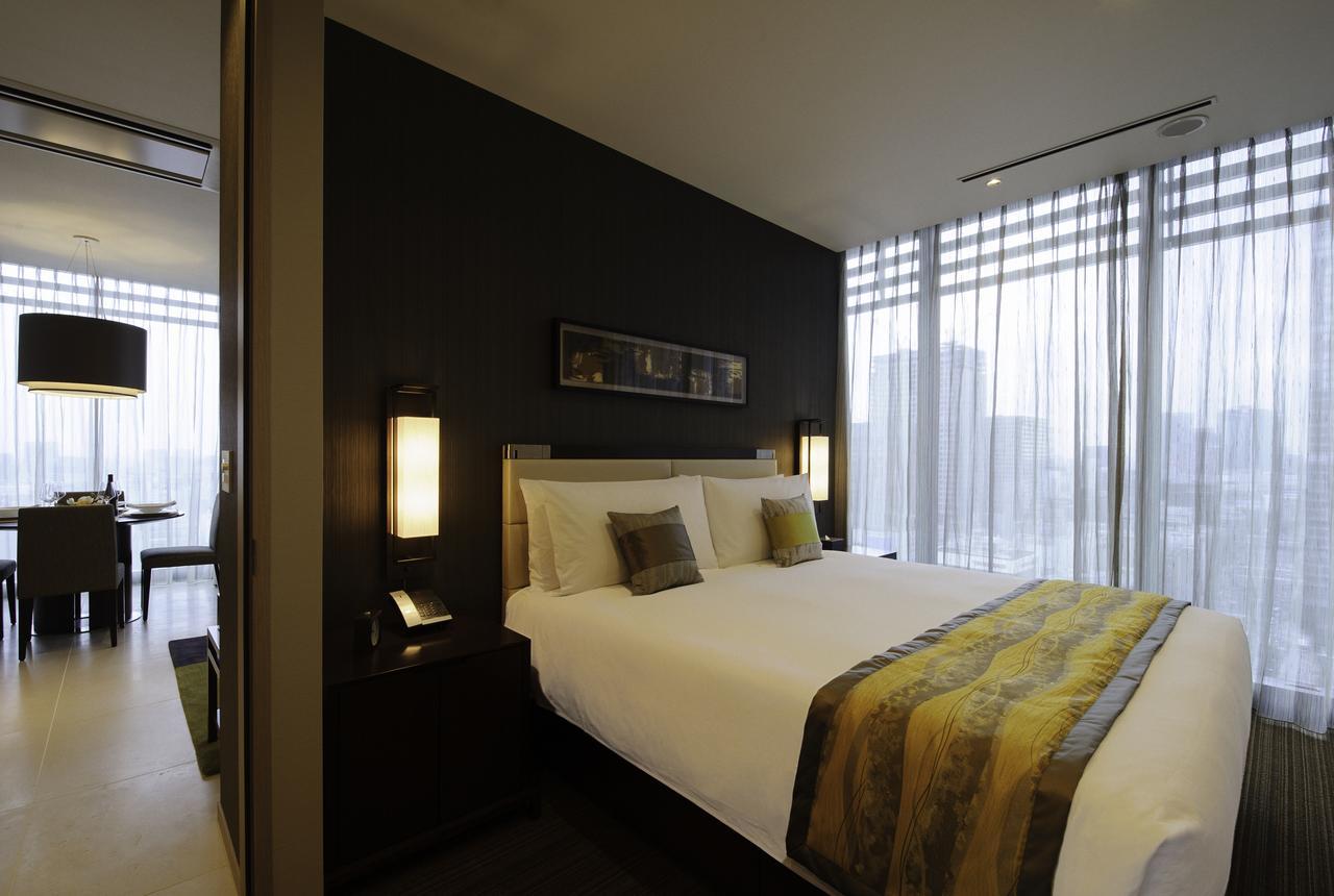 Oakwood Premier Tokyo Hotel Exterior foto A bedroom at the Park Hyatt Hyderabad